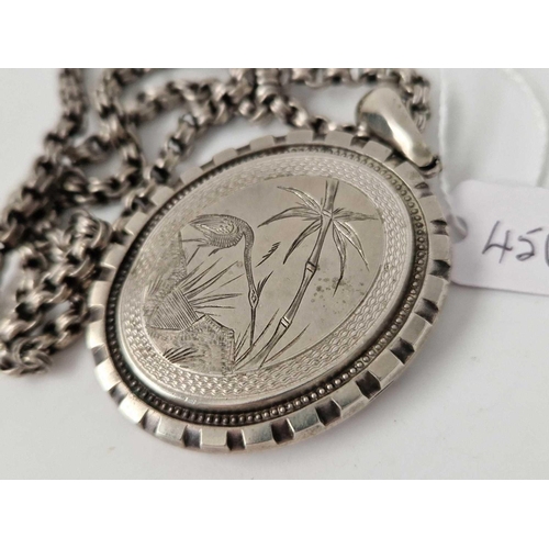 456 - A Victorian locket on silver chain, 18.5 inch