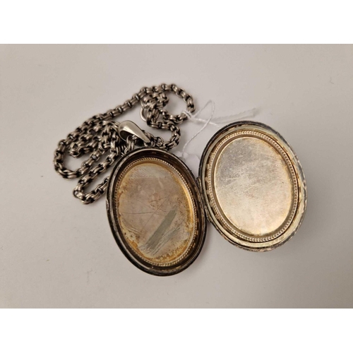 456 - A Victorian locket on silver chain, 18.5 inch