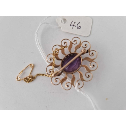 46 - A pearl and amethyst brooch