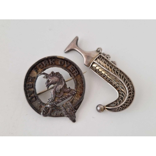 478 - A bag of three silver items a filagree dagger brooch and a butterfly wing ring and silver military b... 