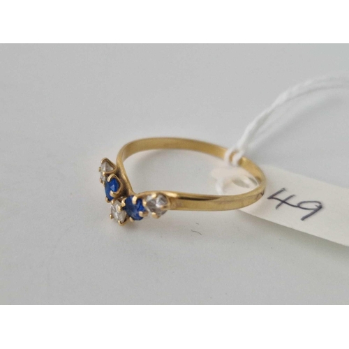 49 - A sapphire and diamond V shaped ring, 18ct, size T