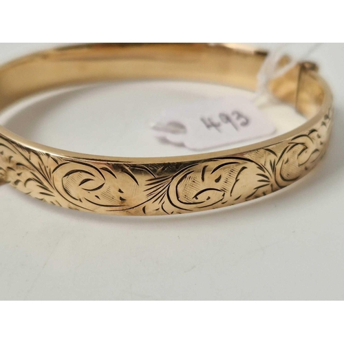 493 - A rolled gold bangle