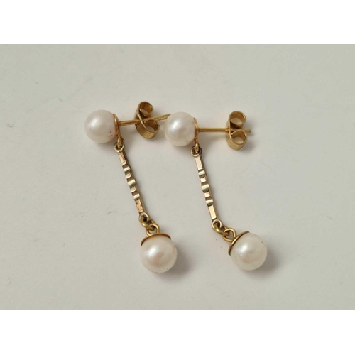 495 - A pair of pearl drop earrings, 9ct