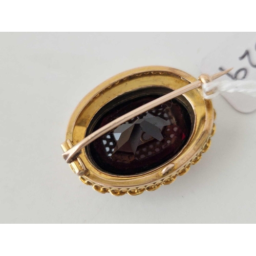 529 - A Edwardian gold garnet and pearl cluster brooch