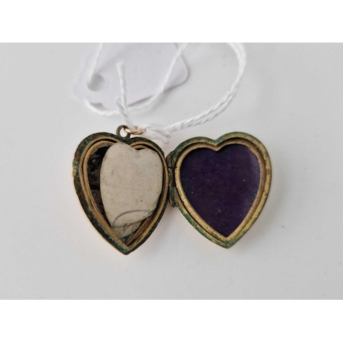 536 - A back and front heart locket 9ct 4.5 gms