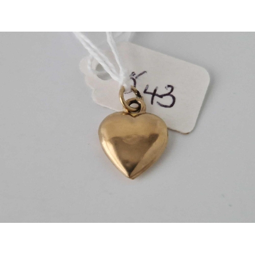 543 - A plain heart charm pendant, 9ct