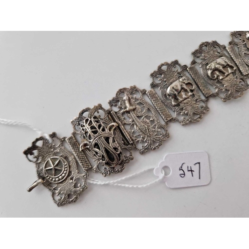 547 - An Indian silver bracelet with Hamza Hand drop, 27 g