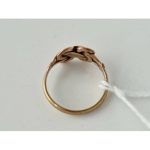 551 - A knot ring 9ct size K 2 gms