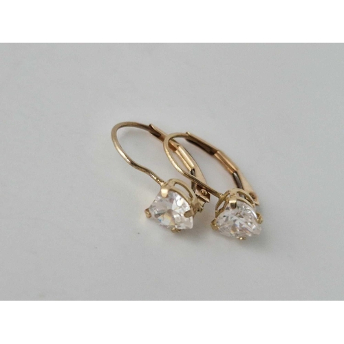 559 - A pair of white stone earrings 10ct gold and a pair of ear studs 9ct