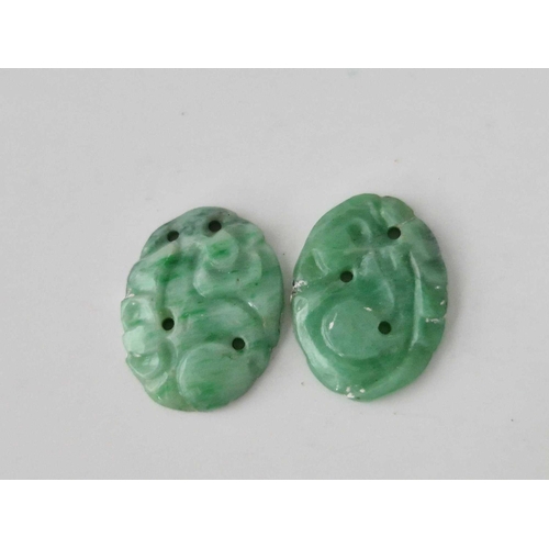 560 - Four carved jade panels