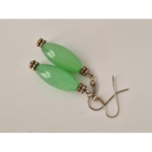 574 - A pair of jade earrings