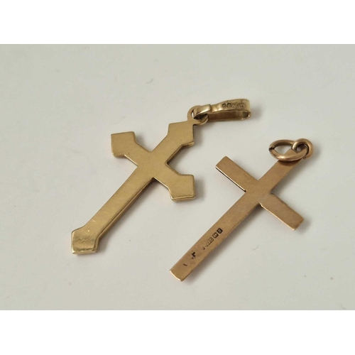 585 - Two 9ct crosses, 2.3 g