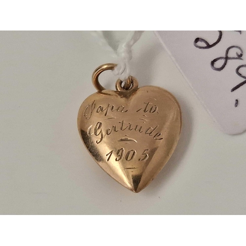 589 - An antique gold heart pendant with diamond, dated 1905