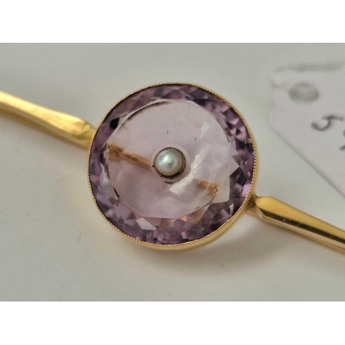 591 - A long brooch with amethysts and pearl, 9ct, 3.75 inch wide, 9 g