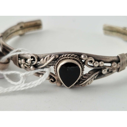 607 - A vintage silver onyx ring and art nouveau silver bangle 26 gms