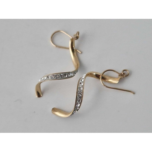 616 - A pair of twist shape earrings, 9ct