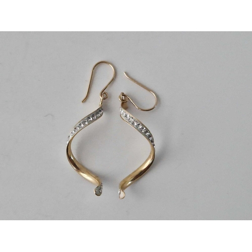 616 - A pair of twist shape earrings, 9ct