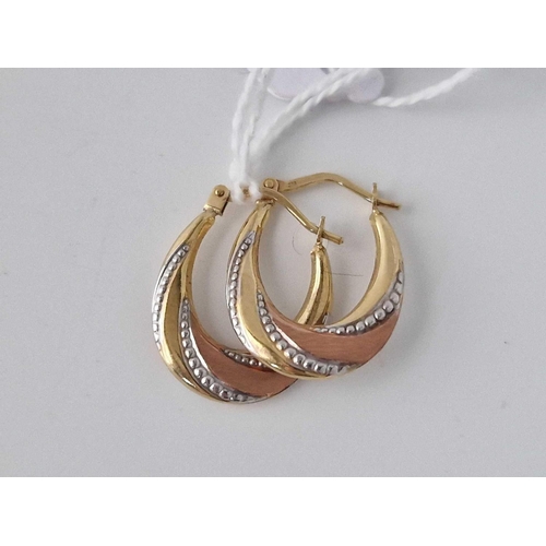 617 - A pair of hoop earrings, 9ct