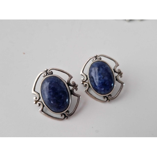 632 - A silver and blue hard stone brooch and earrings set