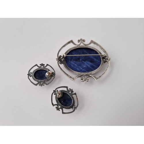 632 - A silver and blue hard stone brooch and earrings set