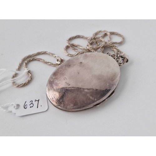 637 - A large silver locket on silver chain, 24.5 inch, 31 g.