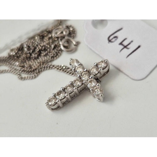 641 - A white gold neck chain with 14ct diamond cross, 3.1 g