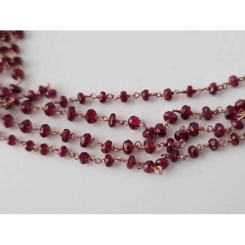 664 - A pretty garnet bead necklace 9ct 48 inch