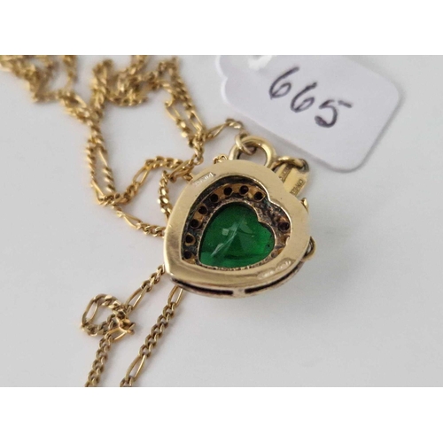 665 - A silver gilt heart shaped green stone pendant necklace