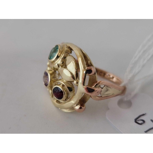 674 - A 1960s two colour gold floral ring set with a emerald amethyst and garnet size N