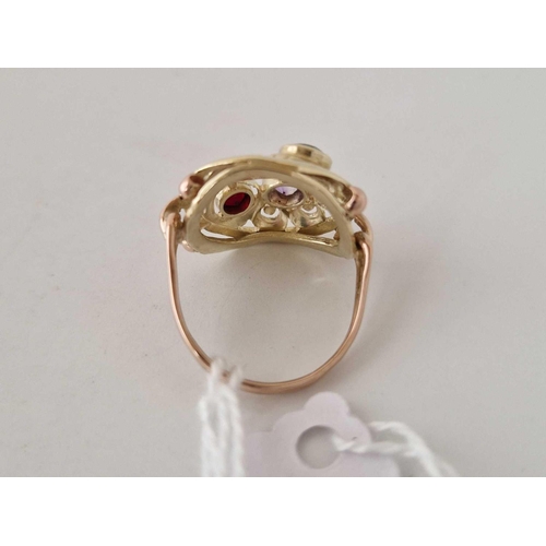 674 - A 1960s two colour gold floral ring set with a emerald amethyst and garnet size N