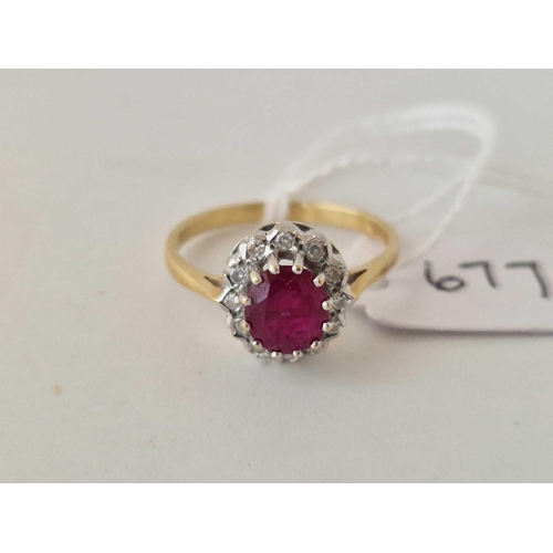 677 - A ruby and diamond oval cluster ring 18ct gold size R