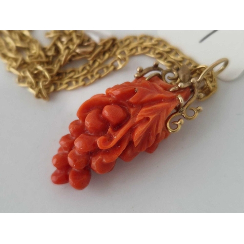 7 - A coral pendant in the form of a bunch of grapes on 9ct neck chain, 15 inch 4.4 g inc