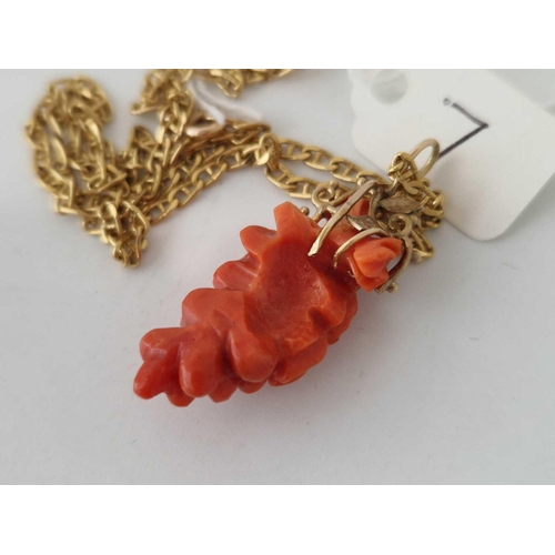 7 - A coral pendant in the form of a bunch of grapes on 9ct neck chain, 15 inch 4.4 g inc