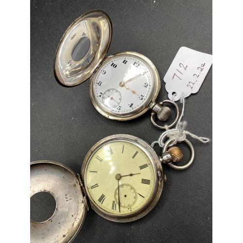 712 - Two silver half-hunter pocket watches, both with seconds dials, one has missing second dial and