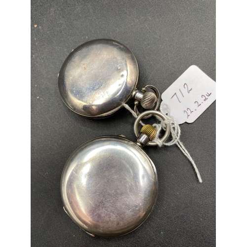 712 - Two silver half-hunter pocket watches, both with seconds dials, one has missing second dial and