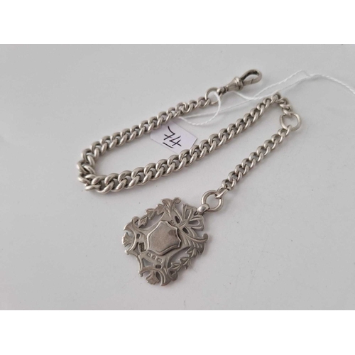 74 - A silver watch Albert chain and medallion 41.8g