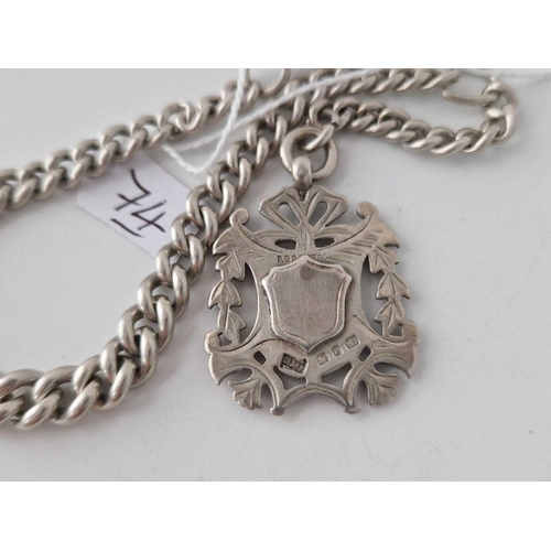 74 - A silver watch Albert chain and medallion 41.8g