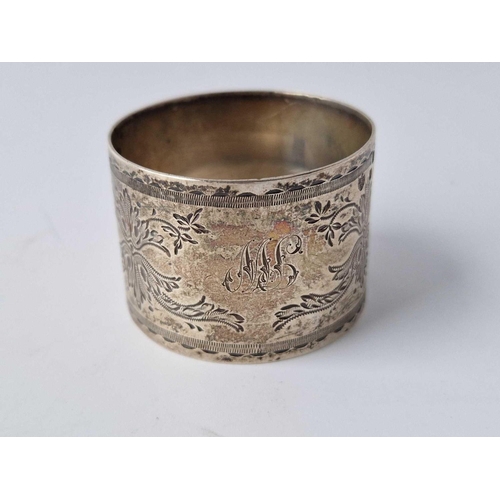 850 - A fancy engraved napkin ring 1896 and a honey spoon, 63g