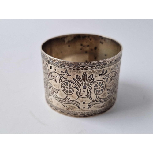 850 - A fancy engraved napkin ring 1896 and a honey spoon, 63g