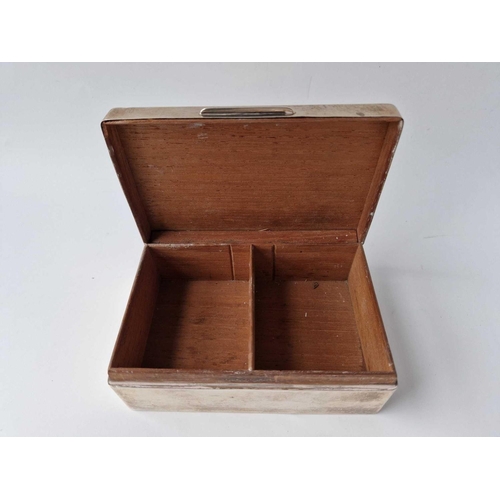 855 - An oblong cigarette box with cedar lined interior, 5.5