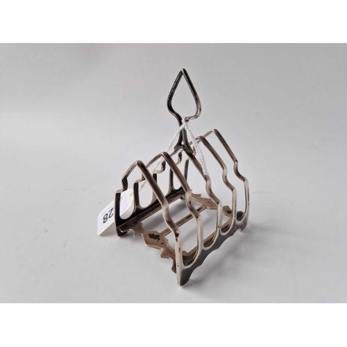 928 - A five bar toast rack with ring handle, 3