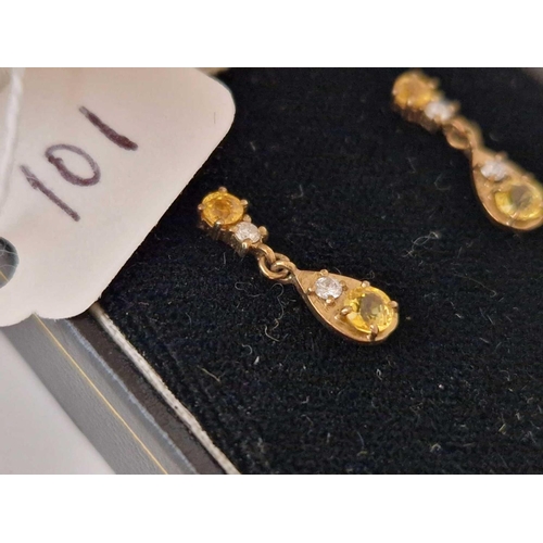 101 - A pair of diamond and citrine earrings 9ct boxed