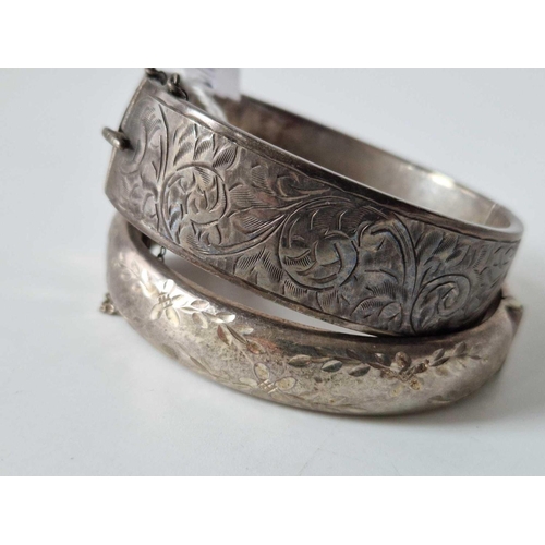 106 - Two silver bangles 47 gms