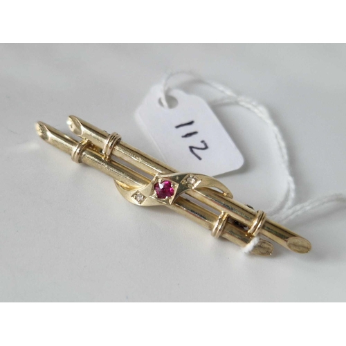 112 - Antique Victorian 15ct brooch with a centre scroll design set with 
Ruby & Diamonds, 3.4g