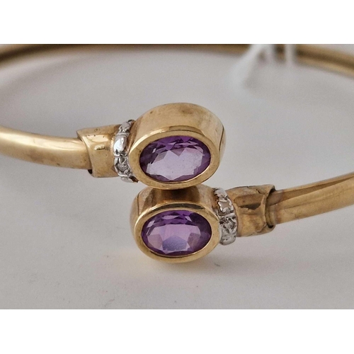 25 - A bangle set with amethysts and diamonds 9ct 6.9 gms