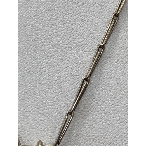 9 - A stylish silver triangular paste and pearl drop pendant on wide link chain 15 inch