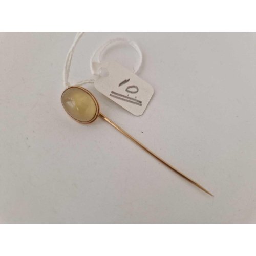 10 - A single stone moonstone stick pin