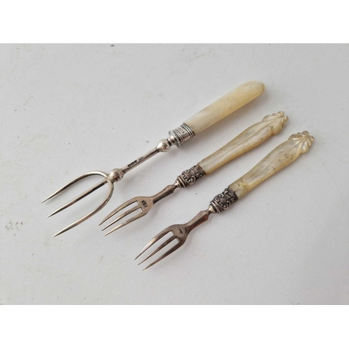 1133 - Three bread and pickle forks. MOP handles