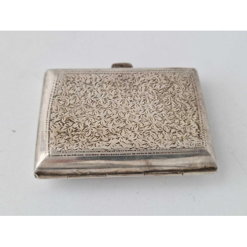 1139 - Attractive, engraved cigarette case, with foliage. Birmingham 1910. 57 gm