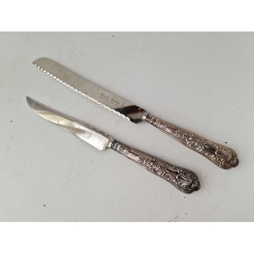 1140 - Two silver handled bread and cake knives